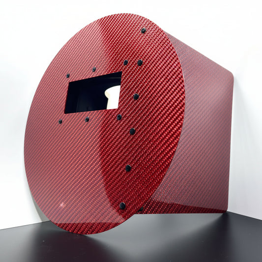 Carbon fiber panel with a textured surface on a white background