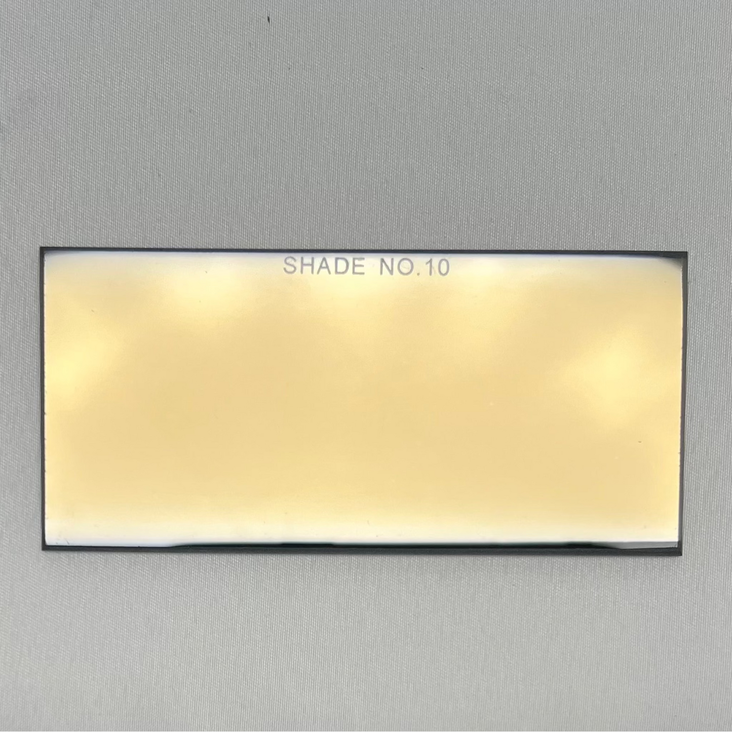 Rectangular light fixture on a gray background Welding_lens_Gold_Shade_10
